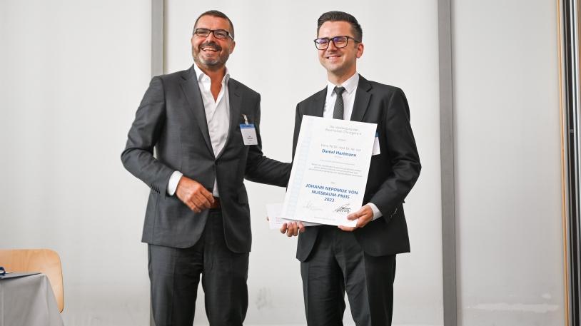 Dr. Dr. Daniel Hartmann neben Prof. Peter Biberthaler  